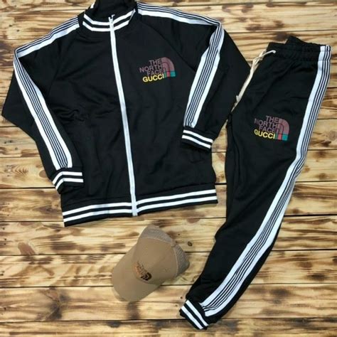 gucci north face suit